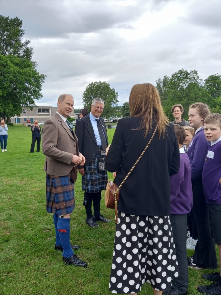 The Earl, with Lord-Lieutenant of Banffshire, speaks to Seafield Primary staff