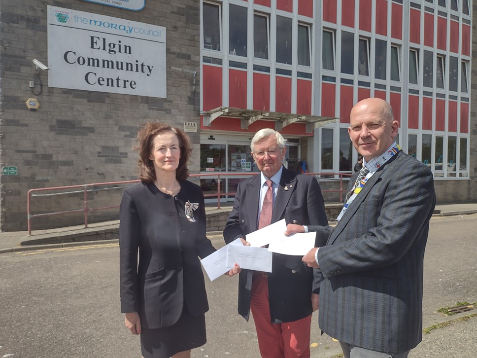 L-R Vice Lord-Lieutenant of Moray, Nancy Robson OBE, Chair of the Moray Emergency Relief Fund, Lieutenant Colnel Grenville Johnston, Moray Council's Refugee and Resettlement Officer, Roy Geddes