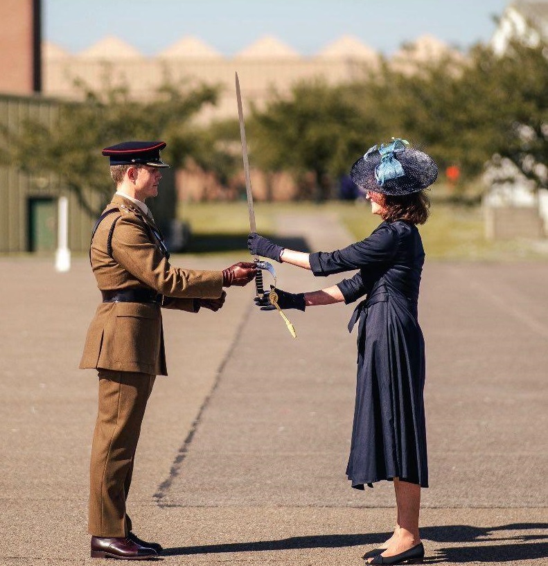 Nancy Robson presenting the Firmin Sword of Peace to Lt Col Adam Birley of 39 Regiment Kinloss on 1st September