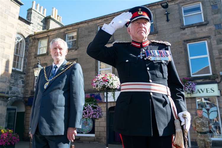 Moray Council’s Civic Leader, Cllr John Cowe and Lord-Lieutenant of Moray Seymour Monro. To celebrate the 30th anniversary of the formation of The Highlanders (Seaforth, Gordons and Camerons), the Scots soldiers led a march along the High Street in Forres.